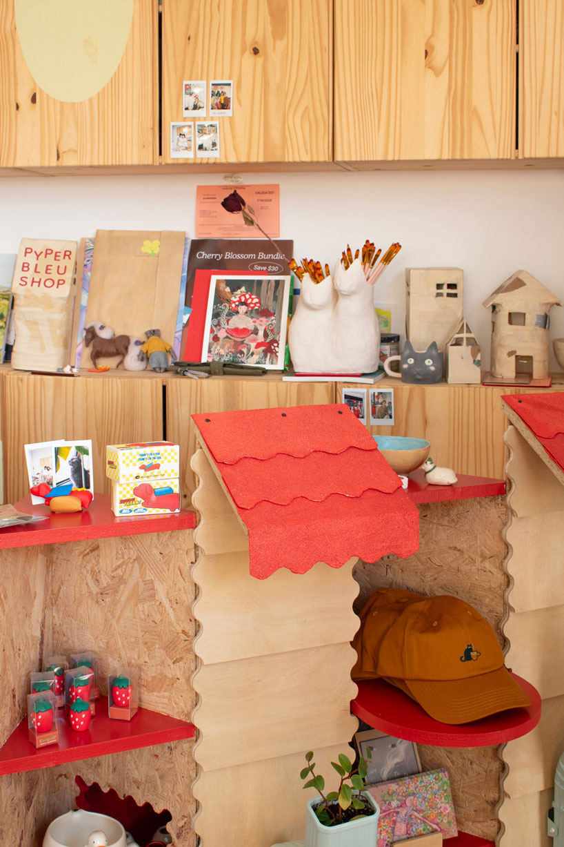 modular timber display rooms reinterpret the checkout counter as an open house facade - 5