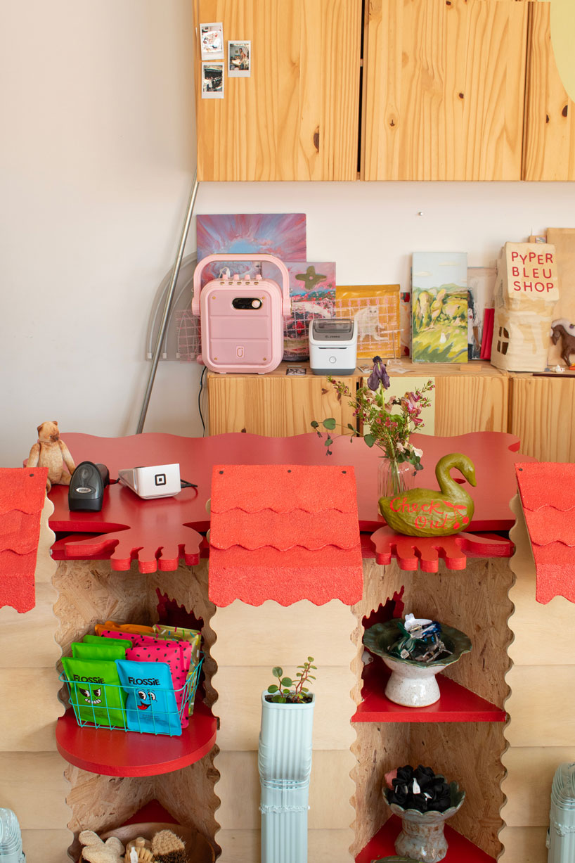 modular timber display rooms reinterpret the checkout counter as an open house facade - 6