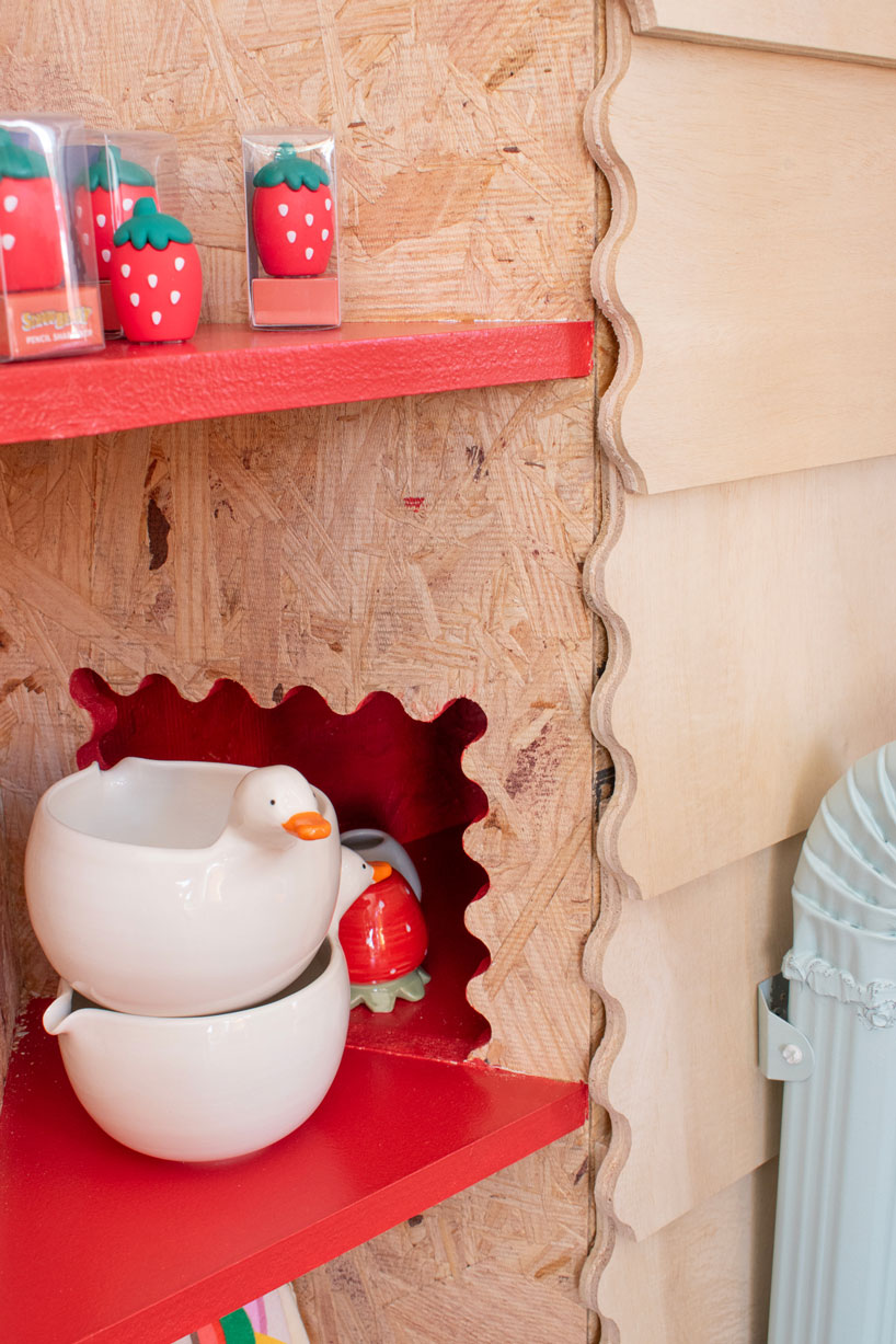 modular timber display rooms reinterpret the checkout counter as an open house facade - 9