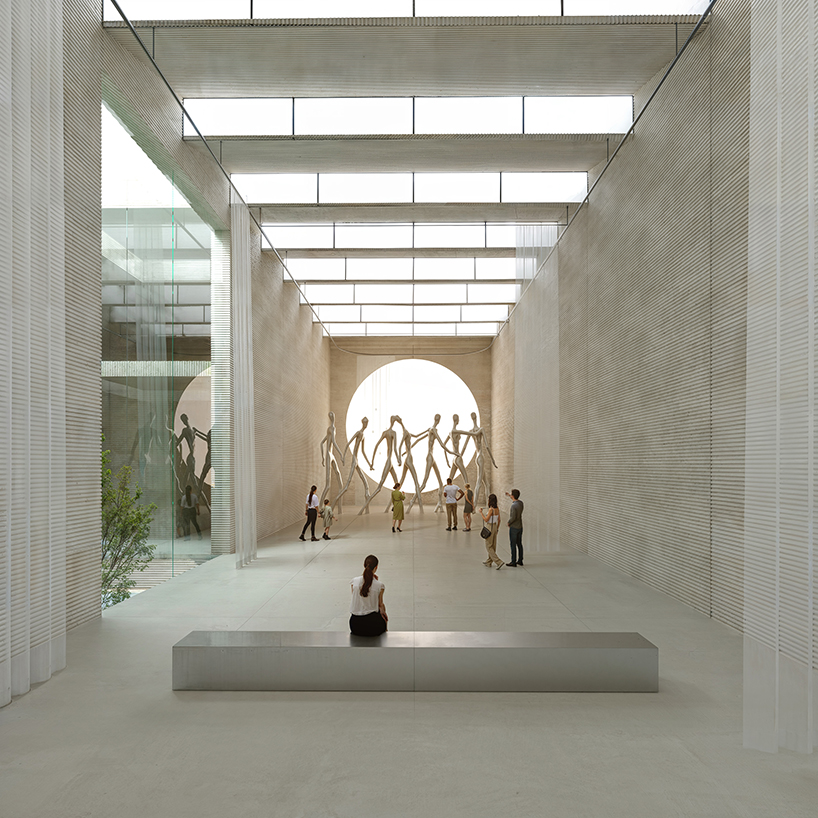 rammed concrete cube and terraced gardens define sunken art center proposal in bulgaria - 6