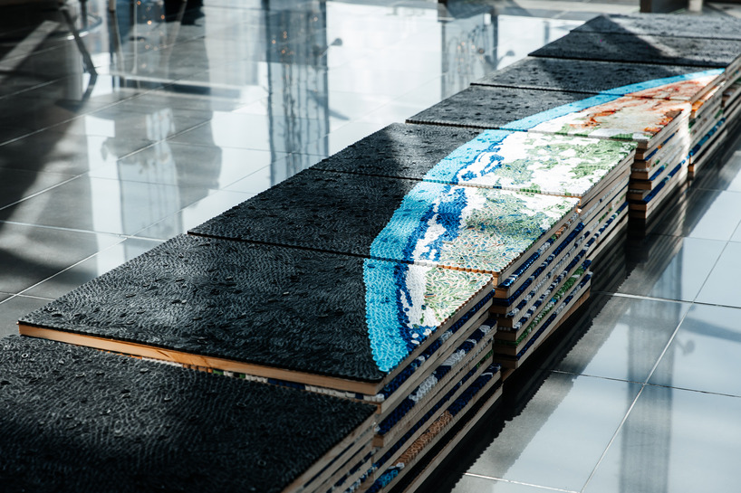 thousands of hand-rolled paper quills compose monumental mosaic earth artwork - 7