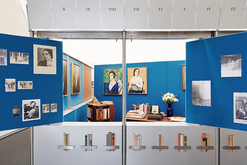 movable exhibition displays animate supervoid’s aluminum library pavilion - 6