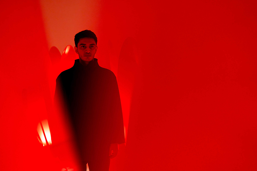translucent red acrylic tulips form a glowing participatory light and sound installation - 5