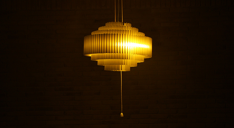 discarded aluminum blinds transform into cylindrical lighting system - 13