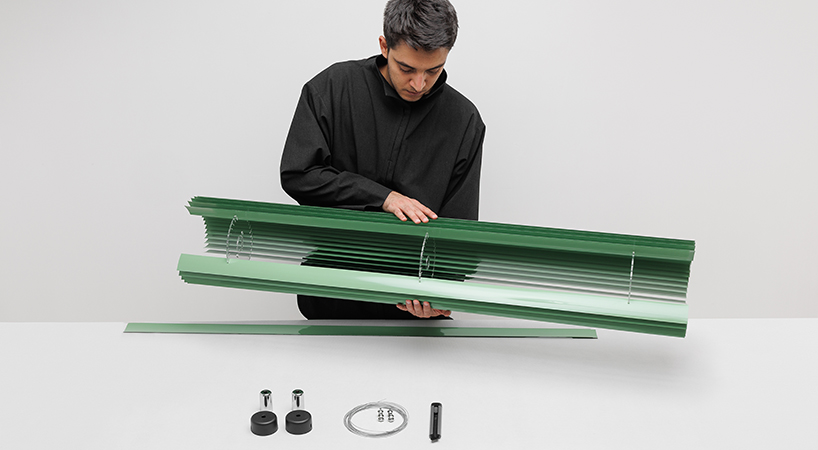 discarded aluminum blinds transform into cylindrical lighting system - 7
