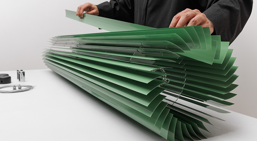 discarded aluminum blinds transform into cylindrical lighting system - 8
