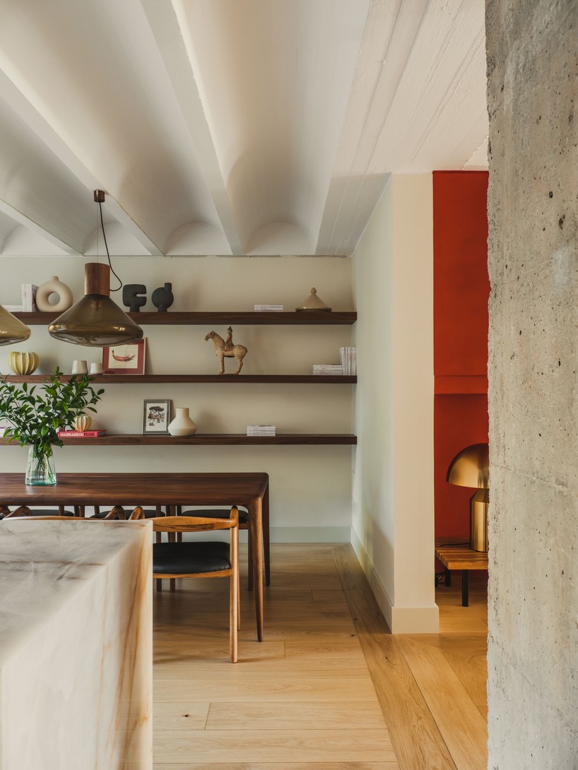 red microcement pairs with onyx marble to reframe brutalist barcelona duplex - 7