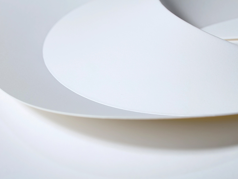 a ribless circular folded sculpture reimagines the traditional japanese paper fan - 5