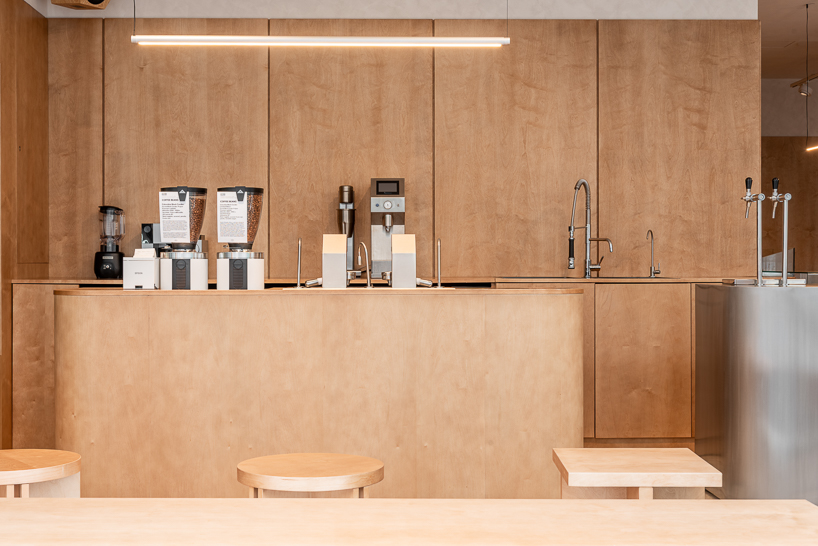 ukyo X blends café, listening bar, and co-working inside restored historic interior in romania - 9
