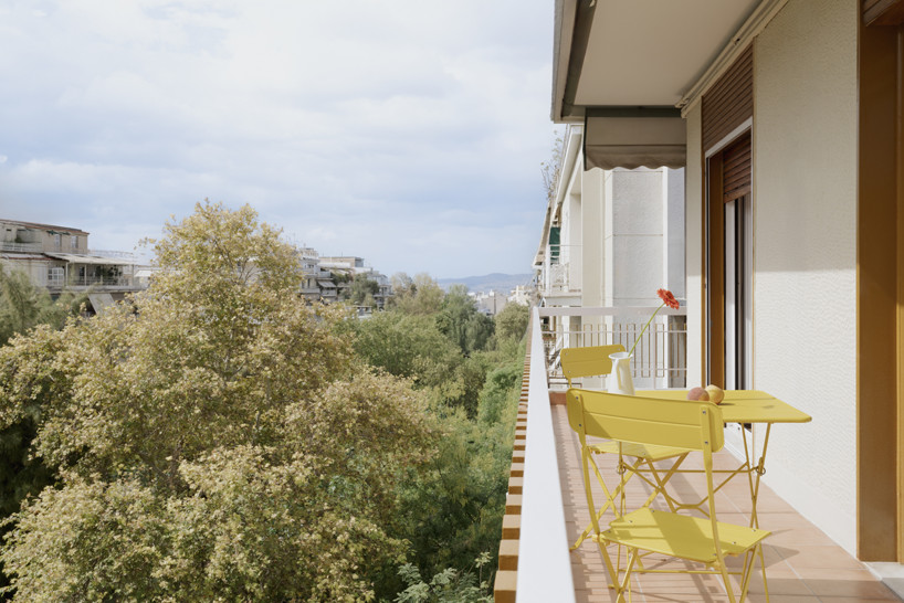 bacchus floor mosaic inspires yellow terrazzo and marble apartment renovation in athens - 1