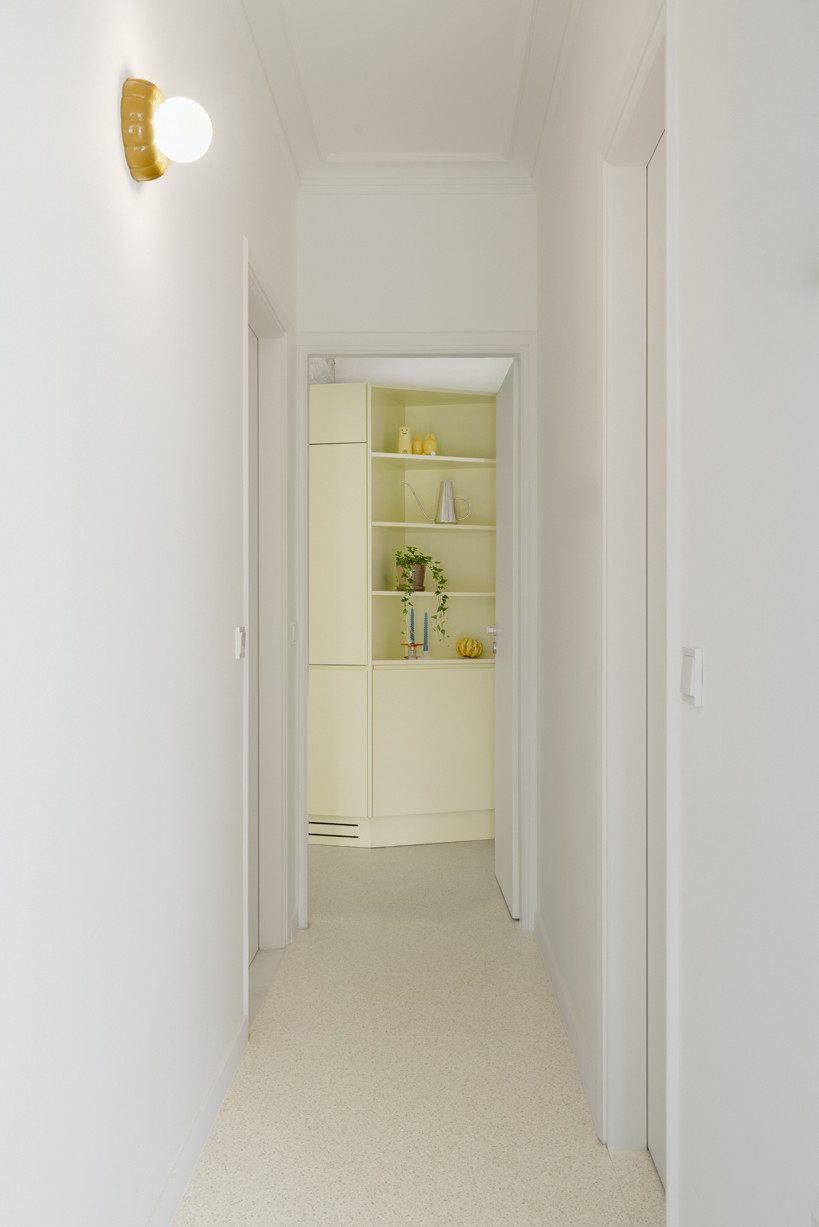 bacchus floor mosaic inspires yellow terrazzo and marble apartment renovation in athens - 4