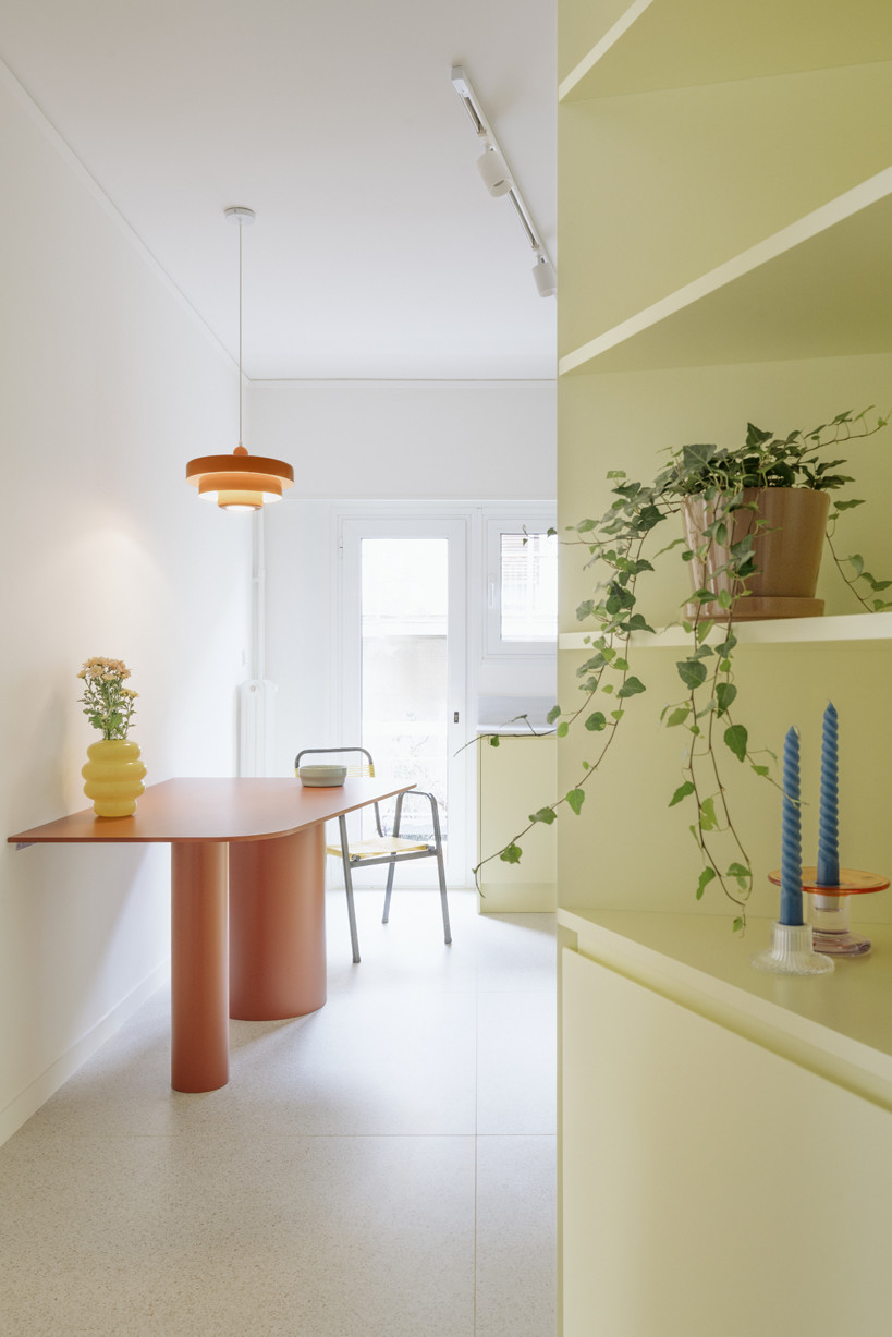 bacchus floor mosaic inspires yellow terrazzo and marble apartment renovation in athens - 6
