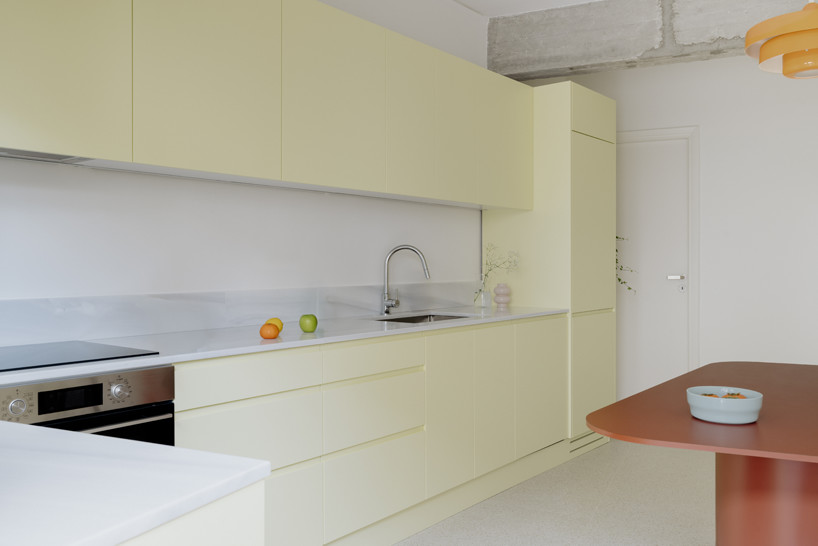 bacchus floor mosaic inspires yellow terrazzo and marble apartment renovation in athens - 7