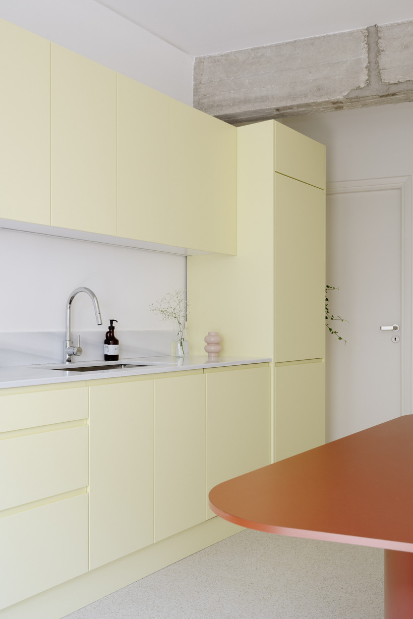 bacchus floor mosaic inspires yellow terrazzo and marble apartment renovation in athens - 8