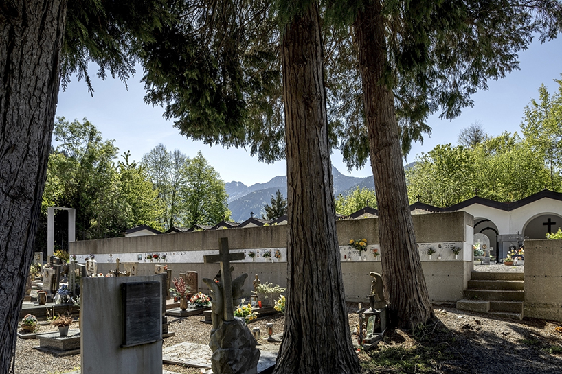 three cemeteries emerge between stone walls and mountain horizons in the carnic alps - 7