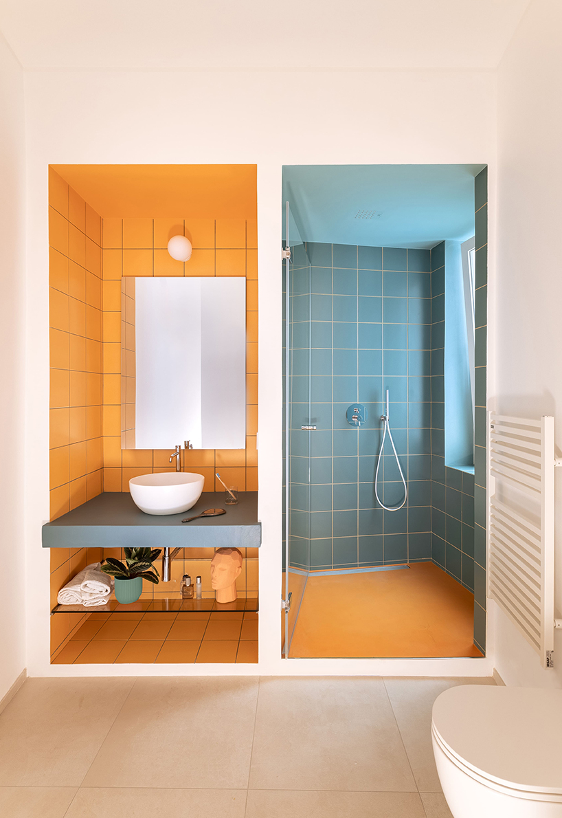folded yellow volume reorganizes genova apartment’s interiors like a game of tetris - 13