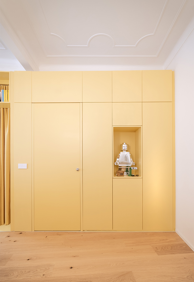 folded yellow volume reorganizes genova apartment’s interiors like a game of tetris - 8
