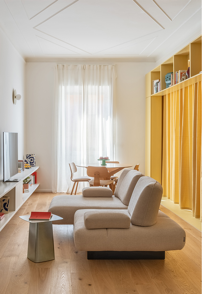 folded yellow volume reorganizes genova apartment’s interiors like a game of tetris - 7