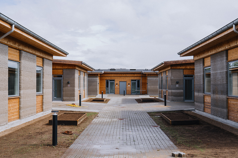 3D printed concrete and cork shape 36 student homes in denmark - 1