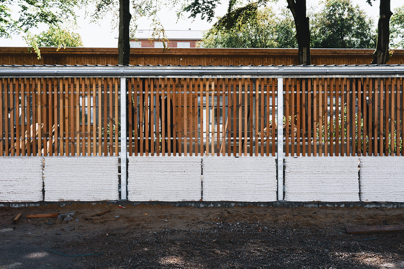 3D printed concrete and cork shape 36 student homes in denmark - 3