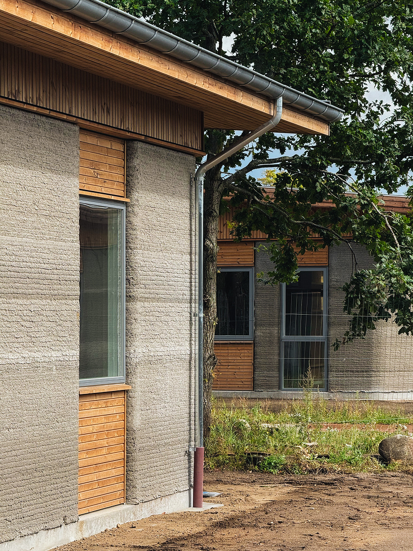 3D printed concrete and cork shape 36 student homes in denmark - 7