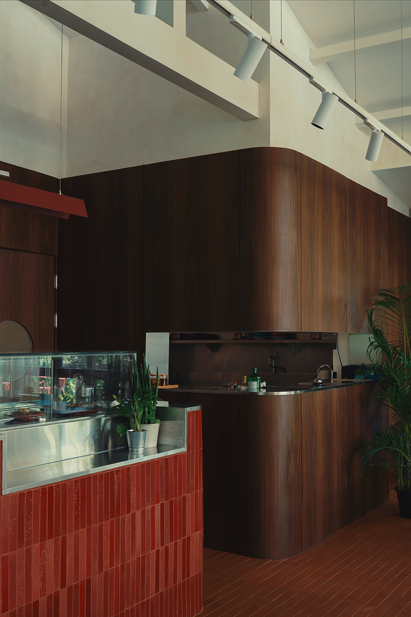 lantern-like pavilion and recycled brick bar reshape bangkok house into arvie restaurant - 5