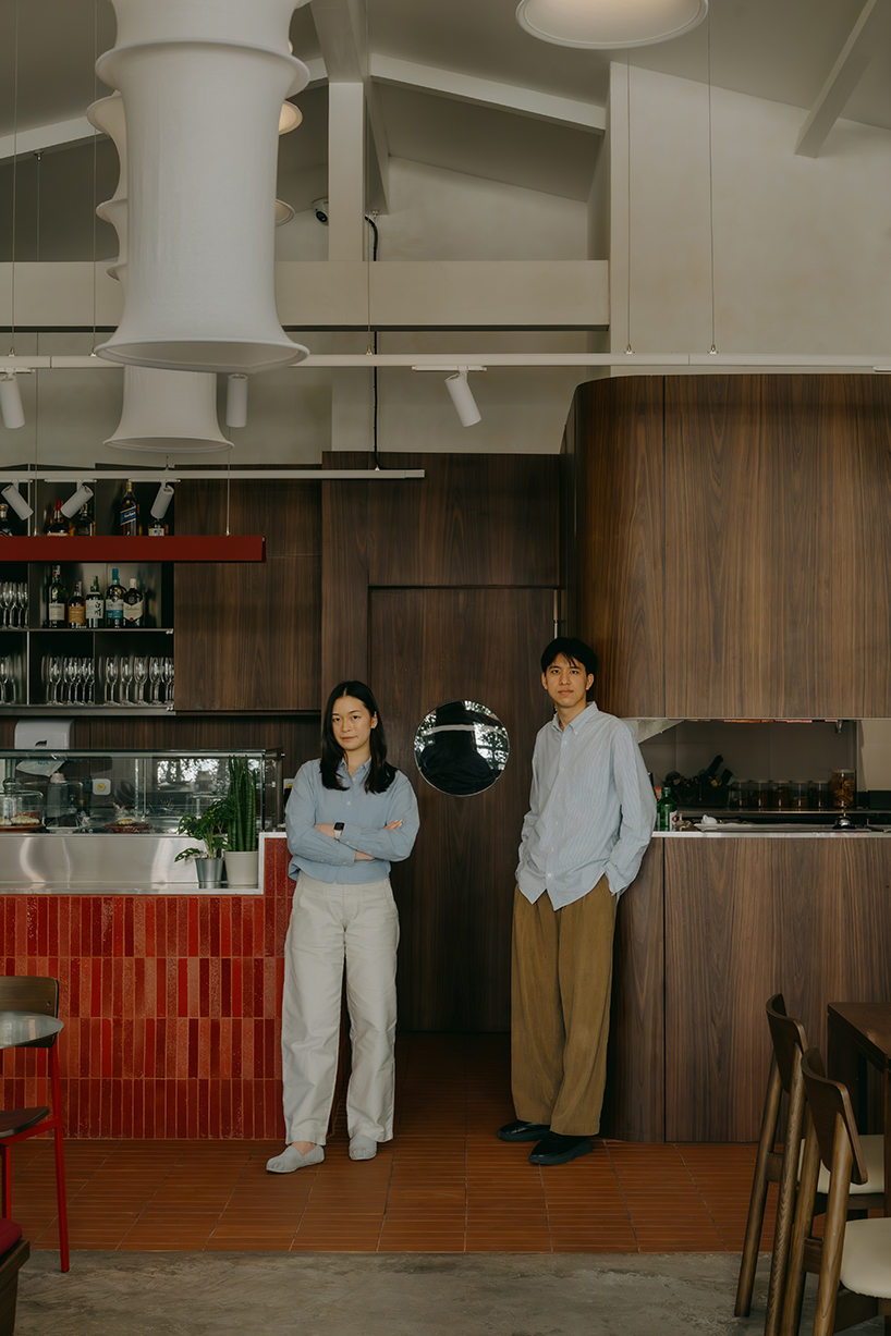 lantern-like pavilion and recycled brick bar reshape bangkok house into arvie restaurant - 6