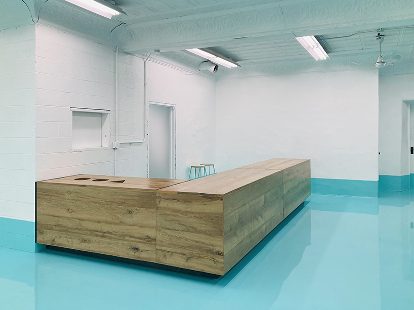 reclaimed oak, cork, and cardboard build flexible furniture for cultural hub in NY - 5