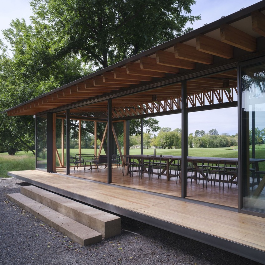 rhythmic timber and glass pavilion unfolds beneath pecan tree canopy in argentina - 4