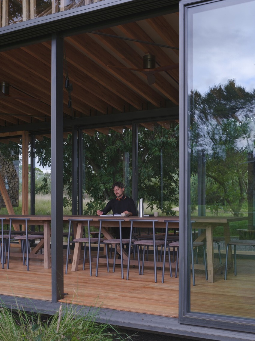 rhythmic timber and glass pavilion unfolds beneath pecan tree canopy in argentina - 5