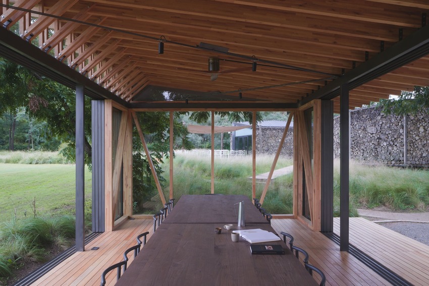 rhythmic timber and glass pavilion unfolds beneath pecan tree canopy in argentina - 6
