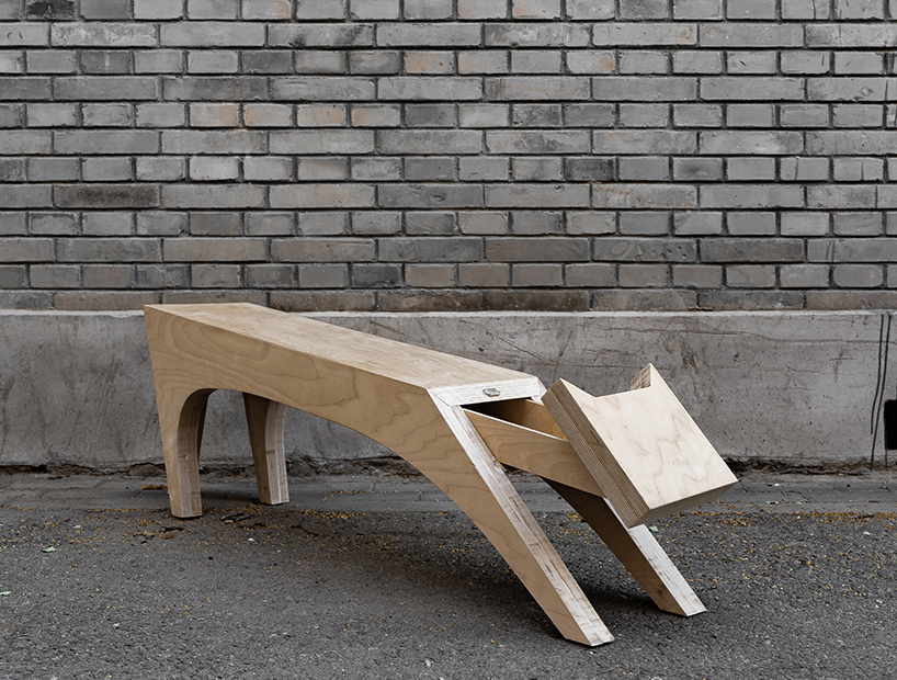 traditional potter’s stand becomes a timber bench shaped like a stretching cat - 5