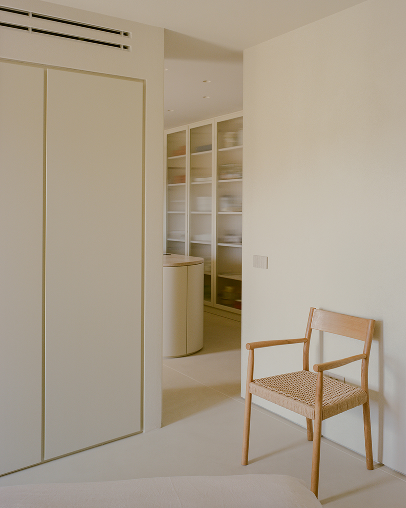 a series of joinery elements replaces walls in 1970s athens apartment renovation - 9