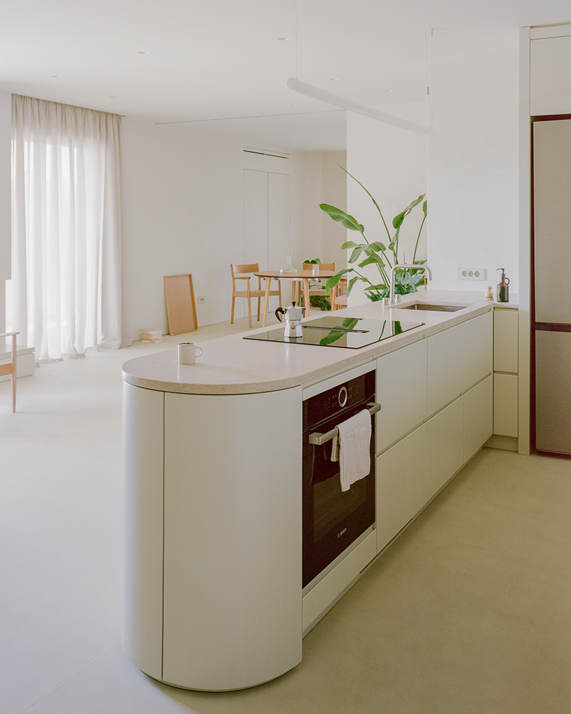 a series of joinery elements replaces walls in 1970s athens apartment renovation - 5