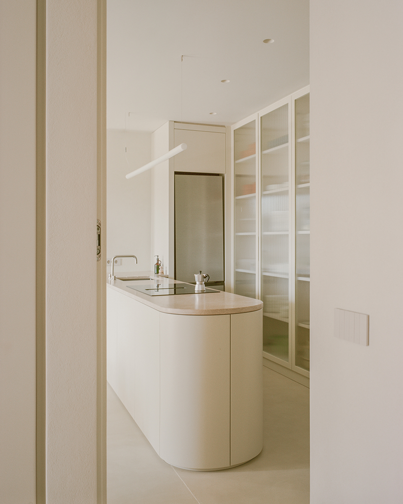 a series of joinery elements replaces walls in 1970s athens apartment renovation - 6