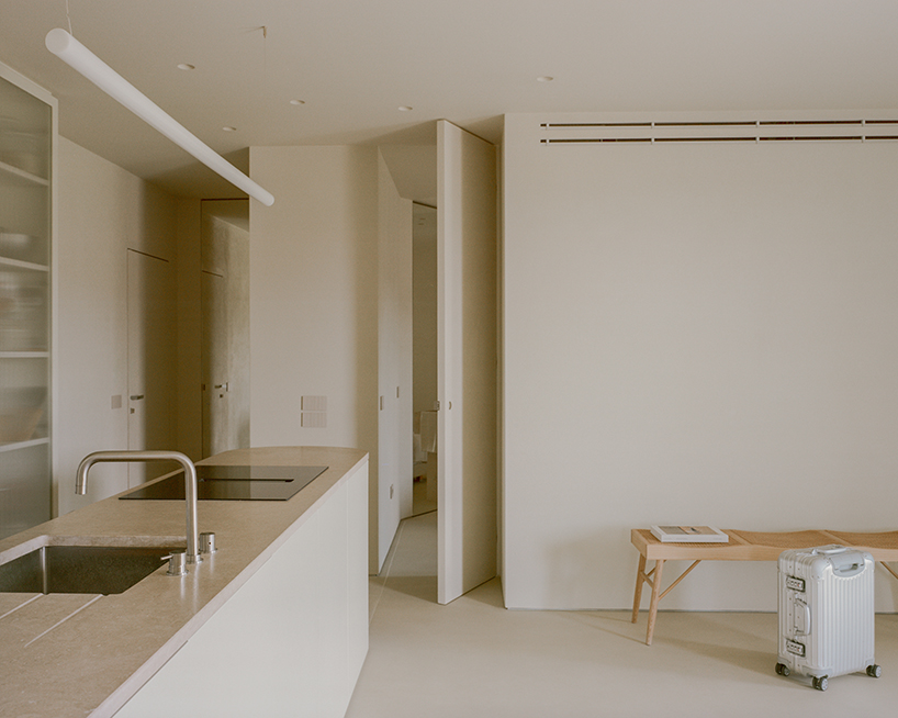 a series of joinery elements replaces walls in 1970s athens apartment renovation - 7