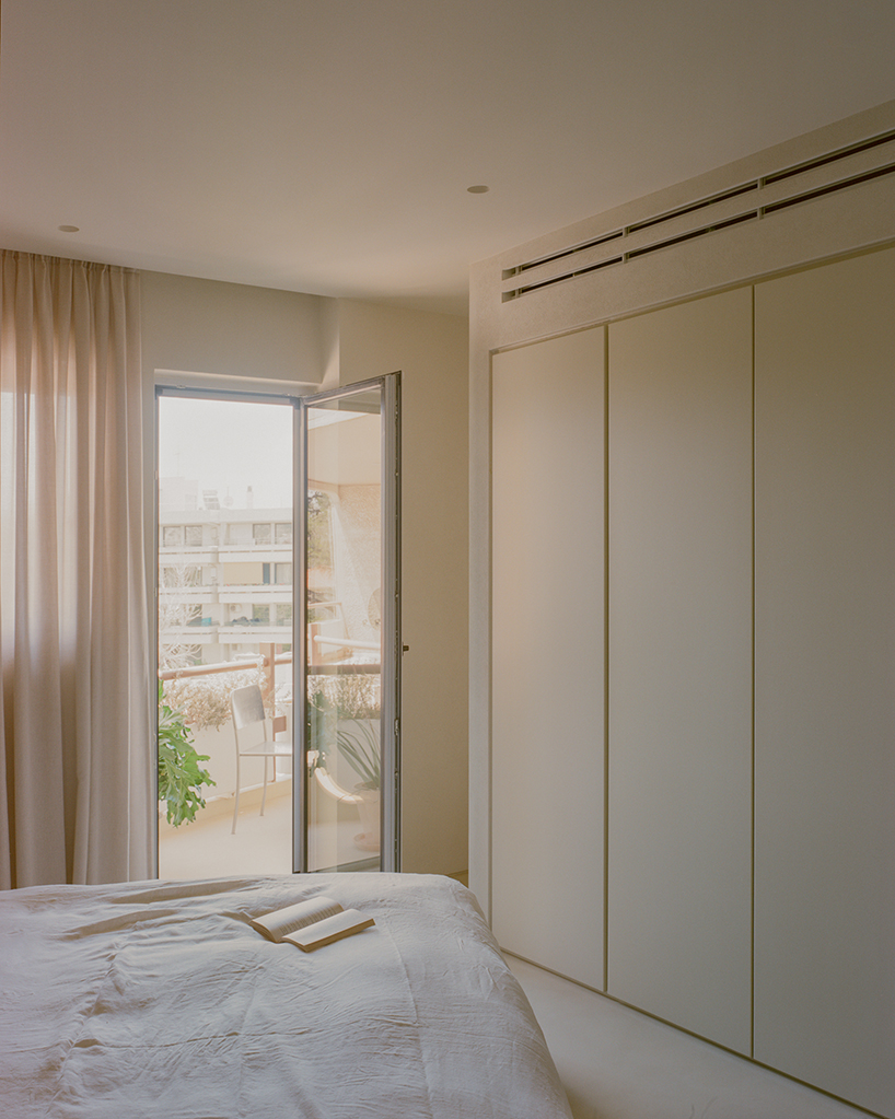 a series of joinery elements replaces walls in 1970s athens apartment renovation - 10