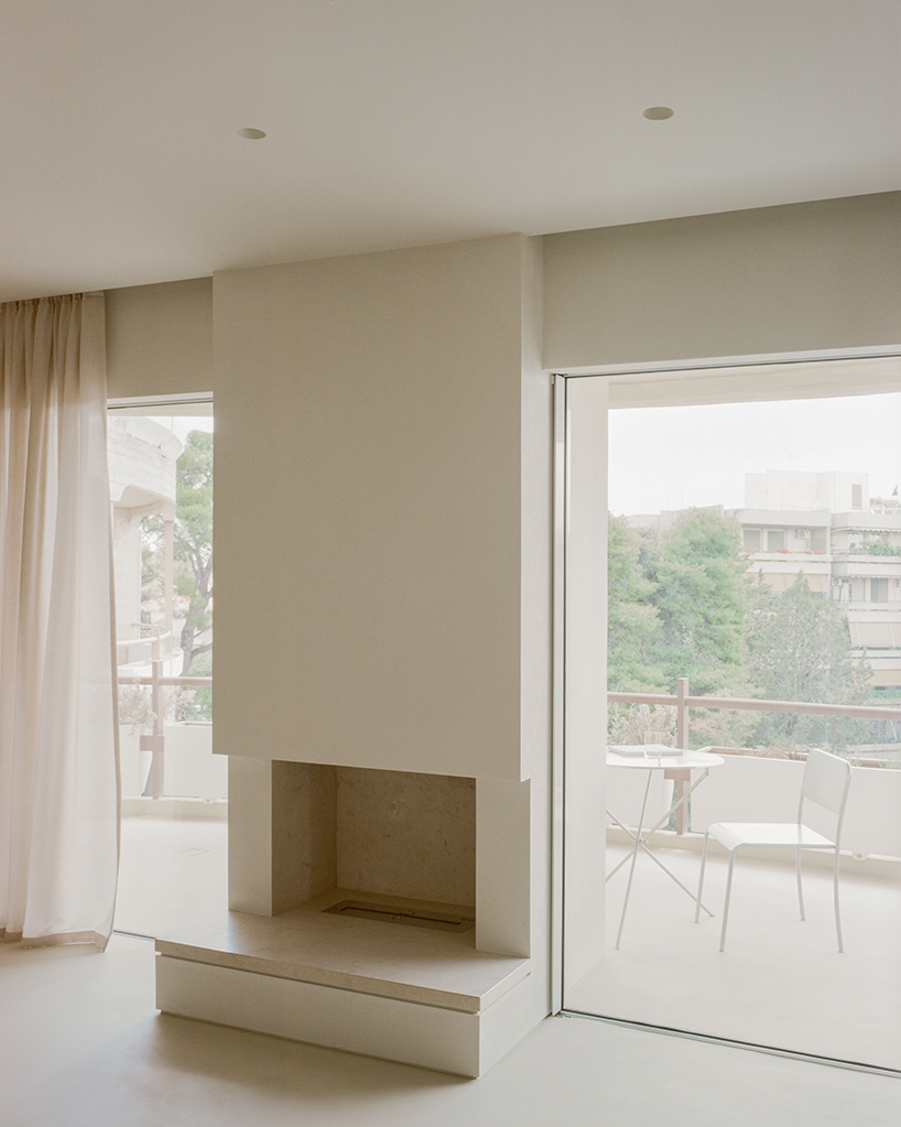 a series of joinery elements replaces walls in 1970s athens apartment renovation - 8