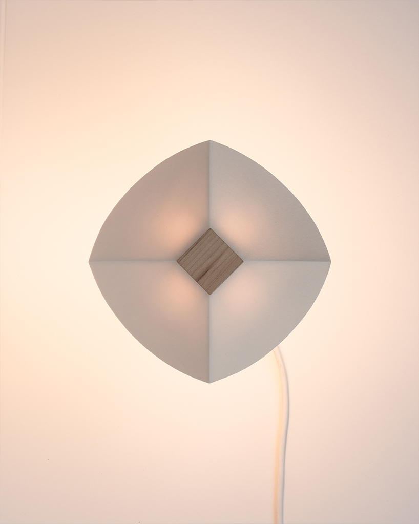 byunggwon nas alit lamp explores how ceramic wood and light interact 4