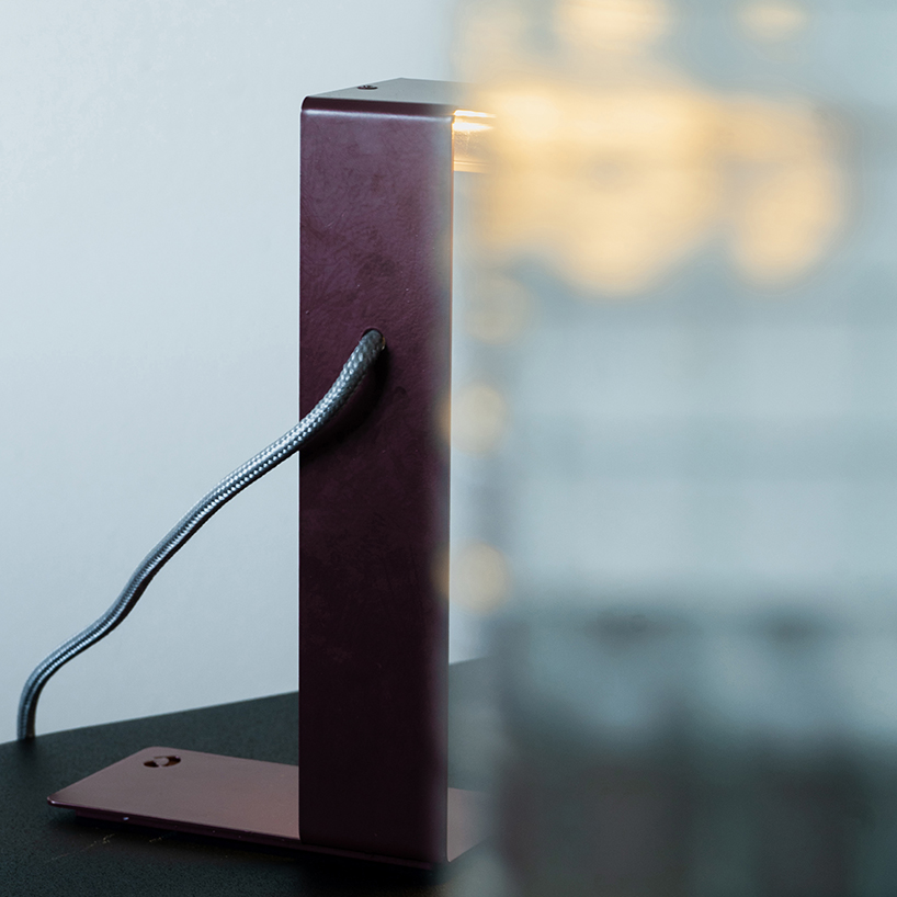 single sheet of folded steel sculpts into z-shaped table lamp - 11