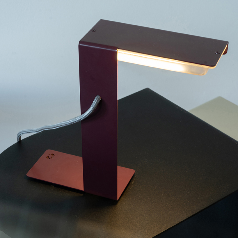 single sheet of folded steel sculpts into z-shaped table lamp - 10