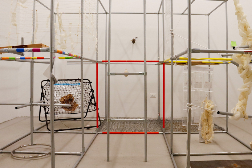 metal pipe grid transforms personal rituals of control into participatory playground - 8