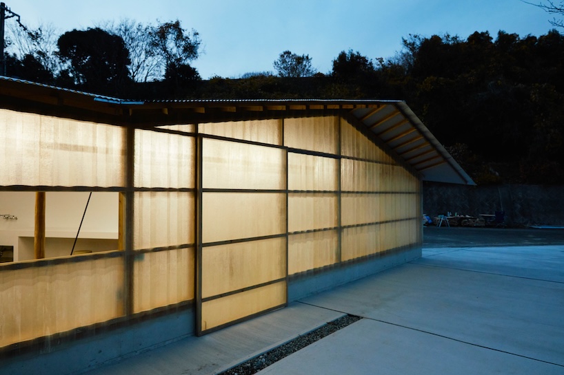 triangular timber structure encloses tsukumo kiln ceramic studio in kobe, japan - 9
