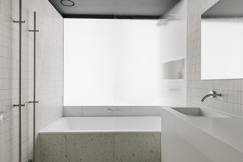mirrors, ribbed glass, and light boxes open up a narrow amsterdam townhouse - 9