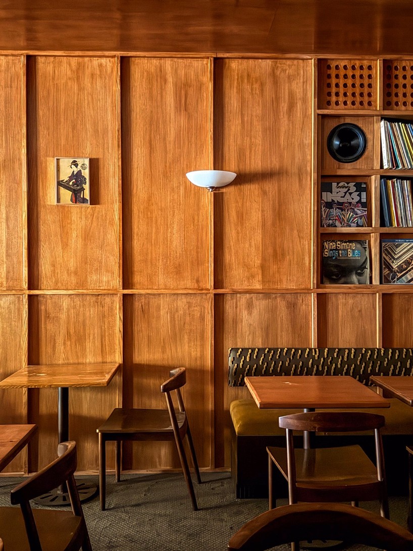 SOBO wraps paris listening restaurant in oak, vintage furniture, and acoustic panels - 2