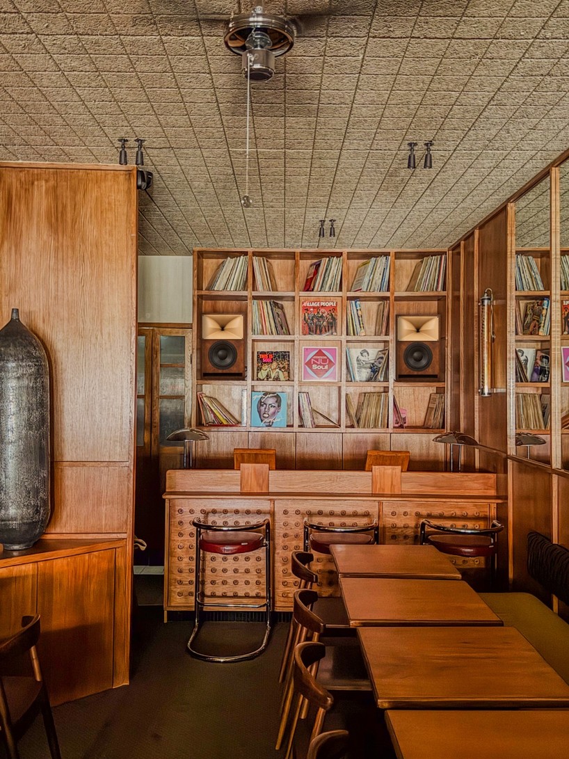 SOBO wraps paris listening restaurant in oak, vintage furniture, and acoustic panels - 3
