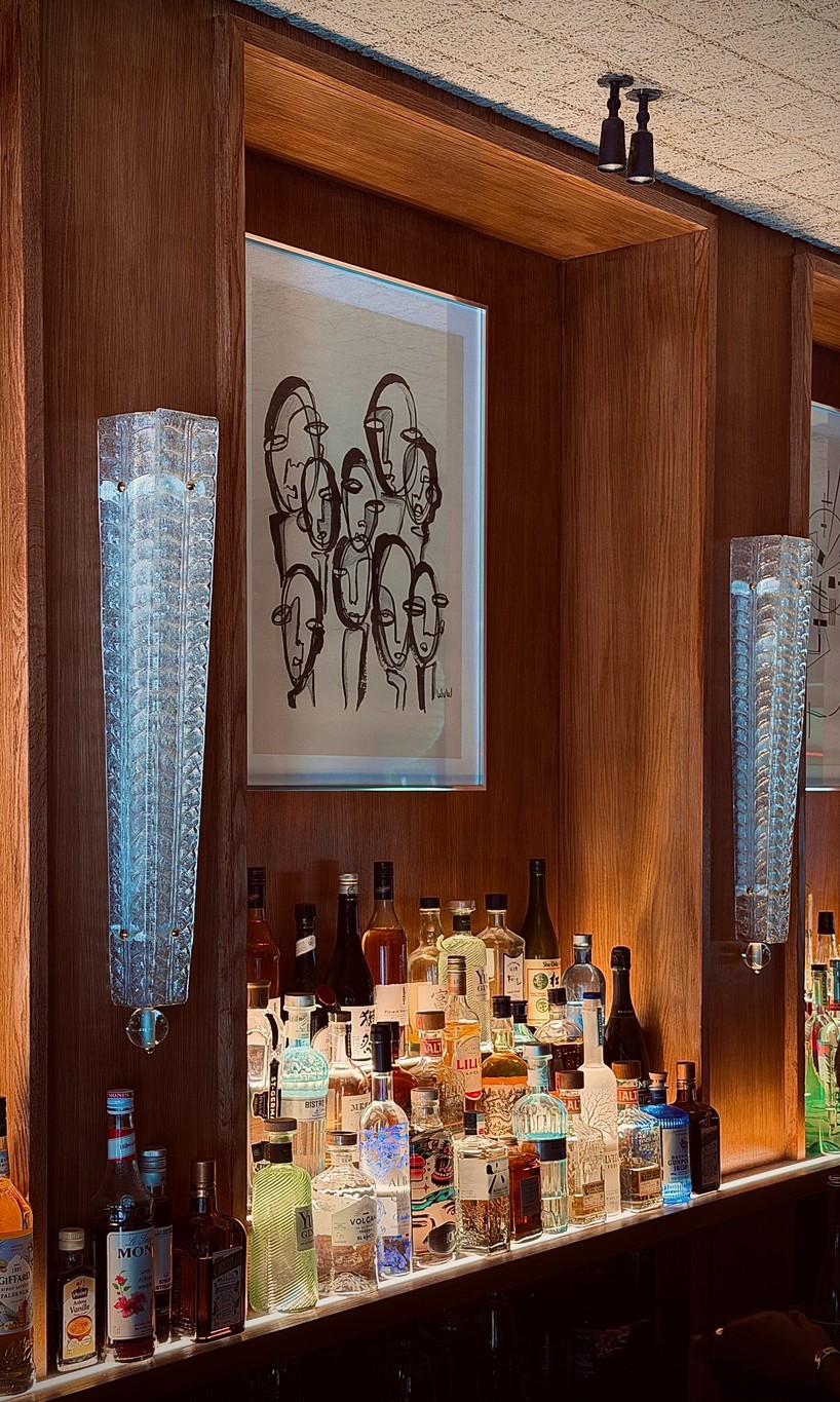 SOBO wraps paris listening restaurant in oak, vintage furniture, and acoustic panels - 6