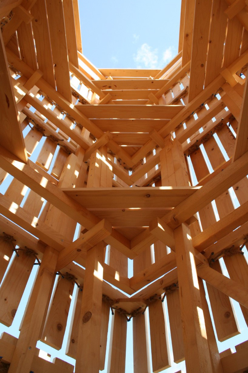 moving shingles envelop timber tower reinterpreting lunano’s stone architecture - 4
