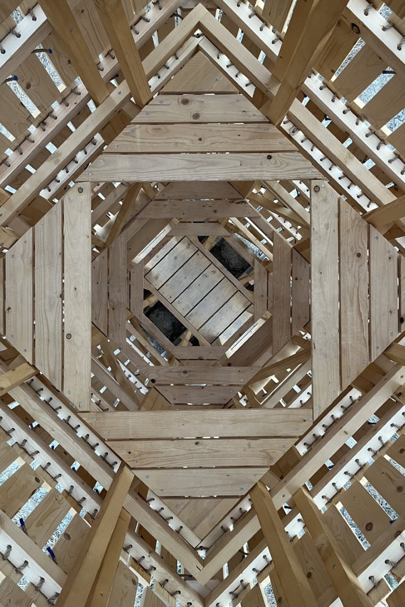 moving shingles envelop timber tower reinterpreting lunano’s stone architecture - 5