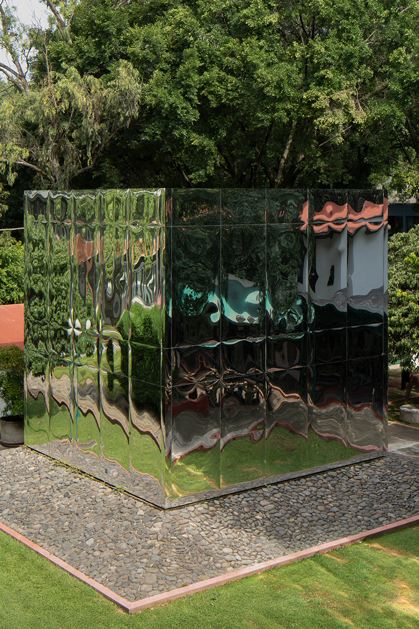 mirrored acrylic skin dissolves cube pavilion into its surroundings in mexico - 3